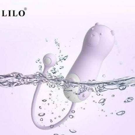 Vibrador oso lila recargable de la marca Frenesí, con diseño adorable y superficie suave para placer personal.