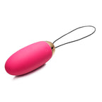 Huevo vibrador Elva Svakom fucsia para parejas, con diseño compacto y estimulante, ideal para uso íntimo.