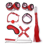 Kit de accesorios BDSM Bondage Fiore de la marca Camtoyz en color rojo, con esposas, cuerda y accesorios de restricción.