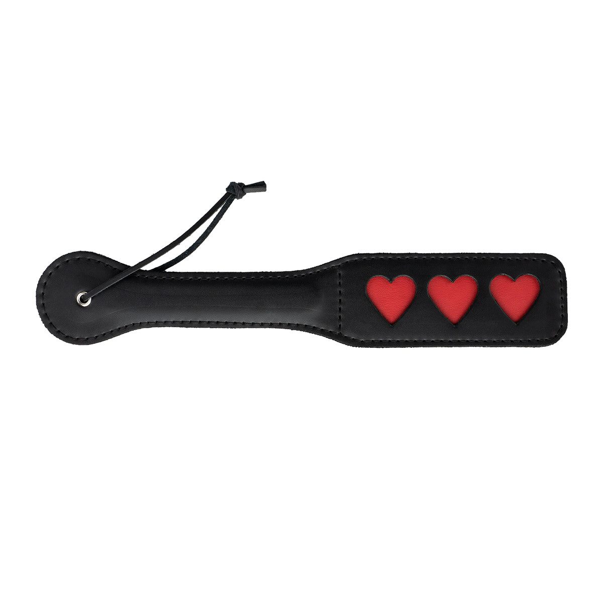 Paleta para nalgadas de color negro con diseño de corazón, marca juguitodecalzonco, cerrada y lista para usar.