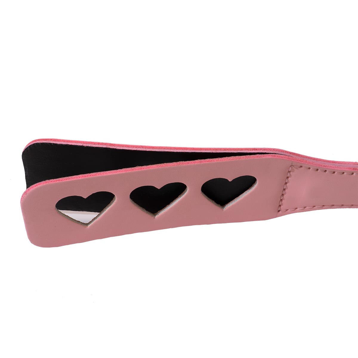 Paleta para nalgadas rosa con forma de corazón, de la marca juguitodecalzonco, abierta y lista para usar.