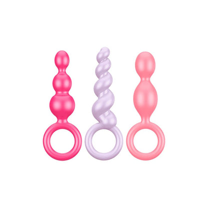 Plug anal Satisfyer Booty Call en colores vibrantes, diseño ergonómico y seguro para uso anal, ideal para placer y exploración.