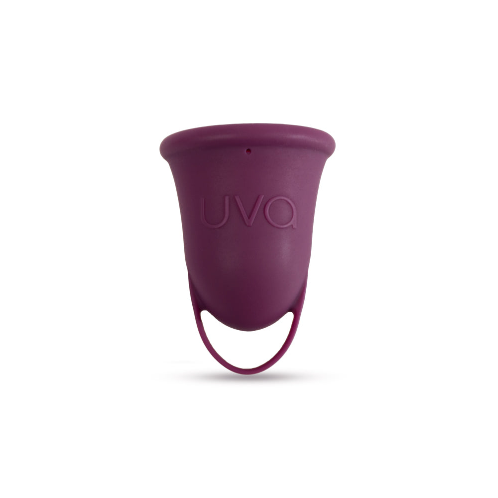 Copa menstrual UVA de gestión menstrual, modelo Talla B en color morado, hecha de silicona suave y flexible.