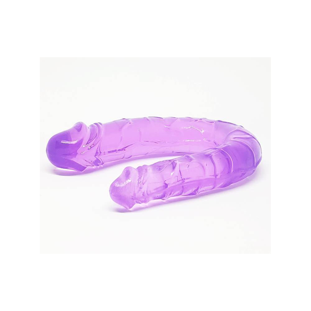 Dildo doble Hydra de la marca juguitodecalzonco, con detalles realistas y doble estímulo, en color transparente.