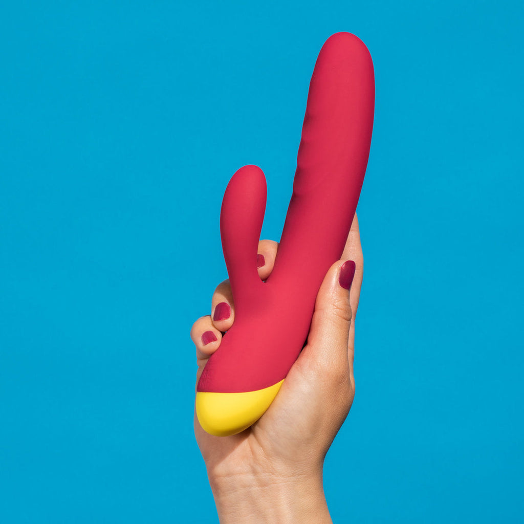 Vibrador de conejo Romp Jazz, con diseño ergonómico y orejas flexibles, en color rosa, para placer y estimulación íntima.