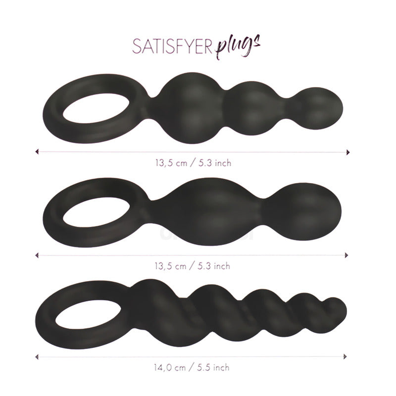 Plug anales Satisfyer Booty Call en color negro, diseñado para uso íntimo, con forma ergonómica y textura suave para comodidad.
